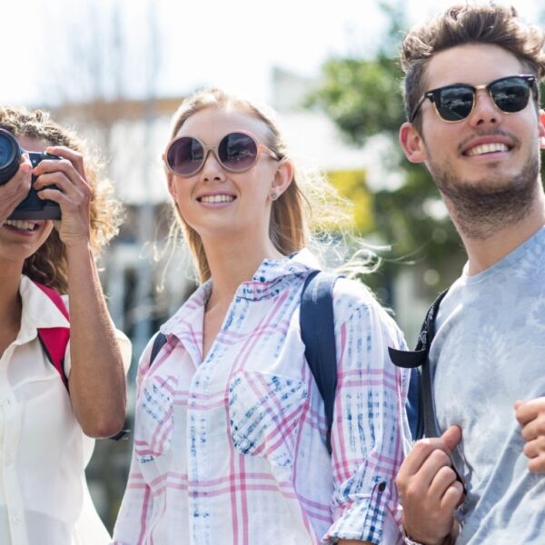 Hip friends visiting a city and taking picture